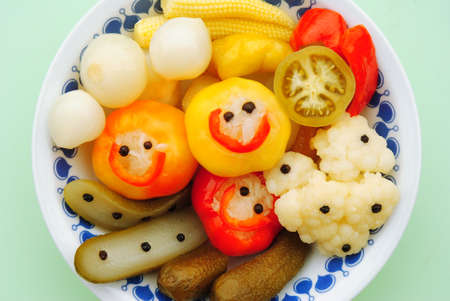 smileing vegetables in healthy saladの写真素材