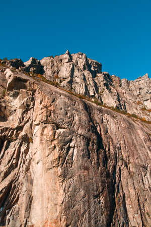 Looking up to a mountain peak.の写真素材