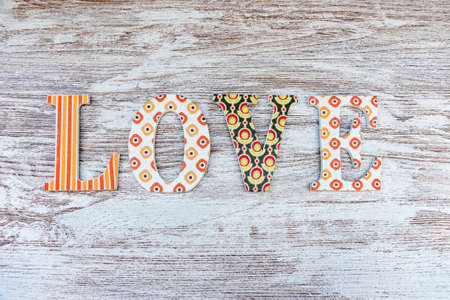 Vintage wooden love letters on rustic background with copy space. Romanticism concept.の写真素材