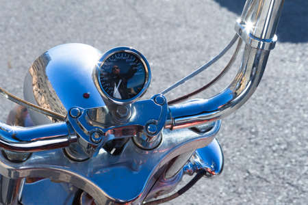 reflection of a chopper motorcycle rider on the motorcycle odometer - focus on the odometerの写真素材