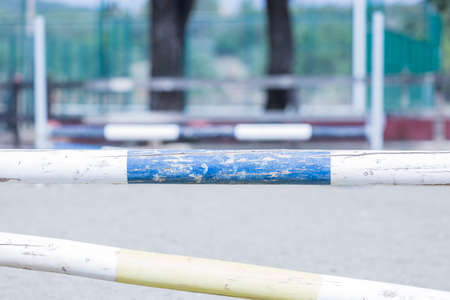 equestrian jumping wood poles on a horse jumping session - useful as a background - focus on the center of the imageの写真素材