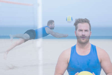double exposure closeup of a young male player is holding a volley ball on a volley sand court at...