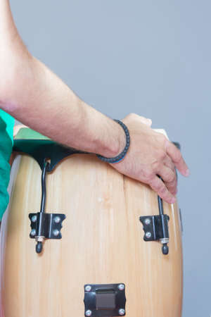 Man's hands playing on traditional African drum. Unrecognizableの写真素材