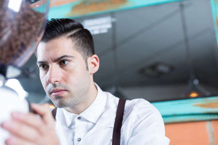 Close-up of bartender working. From below