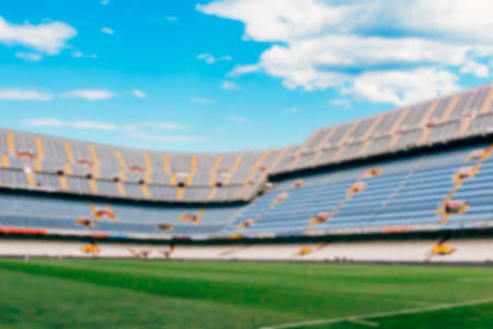 View on blurred football pitch in daylight useful as a background. Copy space areaの写真素材