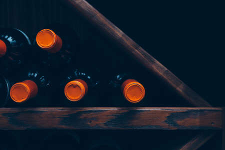 Close-up of several bottles of wine in row. Useful as a backgroundの写真素材