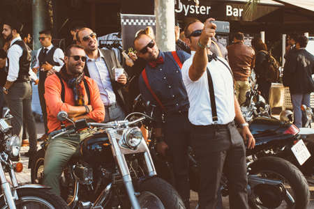 ALICANTE, SPAIN - SEPTEMBER 25, 2016: Motorbike racers are taking a photo with the mobile phone on the Distinguished Gentleman's Ride day, a global fundraiser for prostate cancer and men's health investigationのeditorial素材