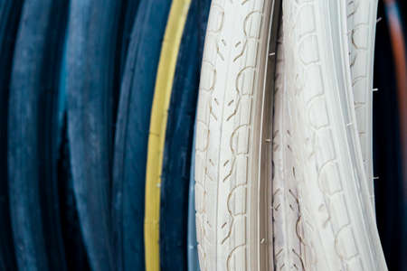 Abstract view on black and white tyres in close-up