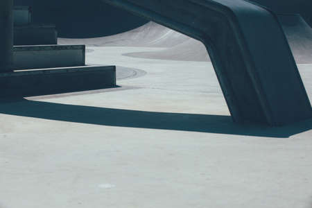 Detail of the railing and the stairs used as obstacle to make tricks in an empty urban skate park....