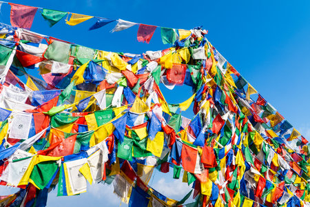Dalai Hills Buddhist Temple with Tibetan Prayer Flags and Scenic Mountain View