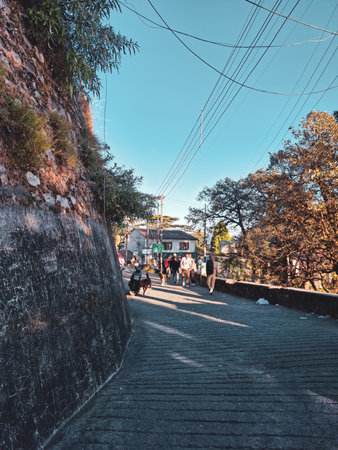 View of people walking on a street in the morningの写真素材