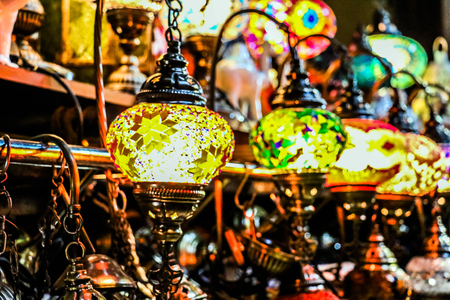 Traditional bright decorative hanging Turkish lamps and colourful lights with vivid colours  in the Istanbul Bazaar, Turkeyの写真素材