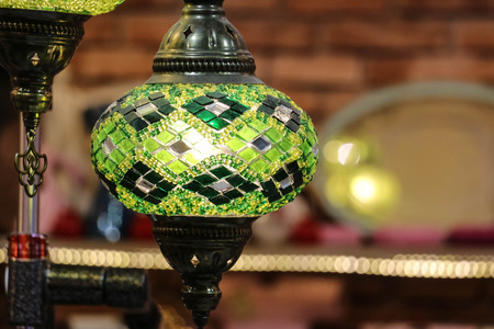 Traditional bright decorative hanging Turkish lamps and colourful lights with vivid colours  in the...