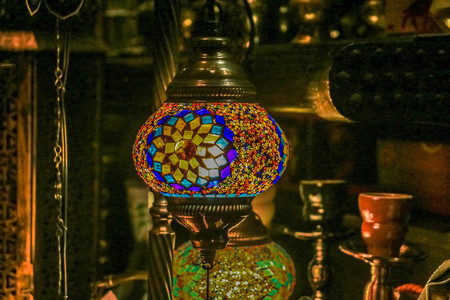 Traditional bright decorative hanging Turkish lamps and colourful lights with vivid colours  in the...