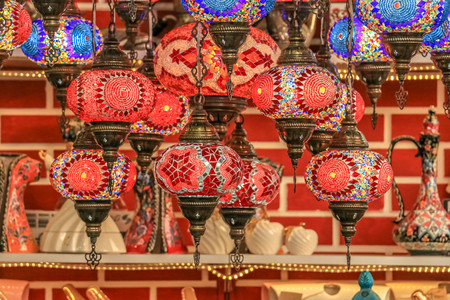 Traditional bright decorative hanging Turkish lamps and colourful lights with vivid colours  in the Istanbul Bazaar, Turkeyの写真素材
