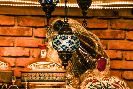Traditional bright decorative hanging Turkish lamps and colourful lights with vivid colours  in the Istanbul Bazaar, Turkeyの写真素材