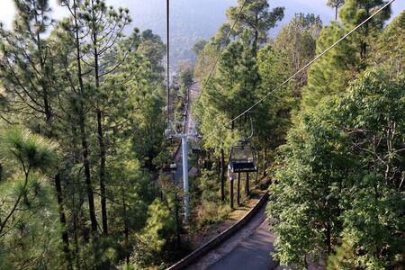 Lush Green Pine Trees Forest Landscape and Patriata Chairlift, New Murree, Punjab, Pakistanの写真素材