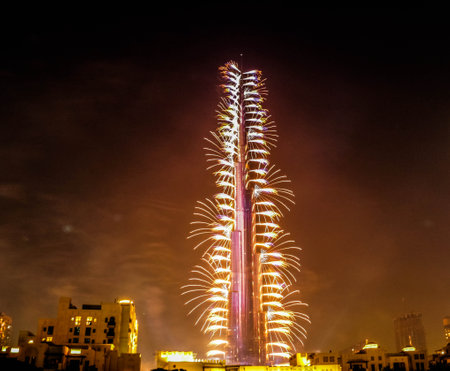 Dubai, United Arab Emirates - 01/01/2019 - Explosion of multi-colored fireworks at Burj Khalifa Dubai against the night sky on a new year celebrations holidays in Dubai, UAEのeditorial素材