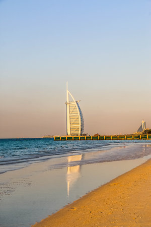 Dubai, United Arab Emirates - 11/20/2019 - Waterfront view of Burj Al Arab, Seven Star Hotel, A view from Jumeirah Beach, Arabian Sea, Residential and Business Skyscrapers, Dubai, UAEのeditorial素材