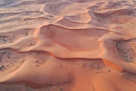 Drone view of Dry Desert in Dubai with Sand Ripples, High Dune Desert in United Arab Emiratesの写真素材