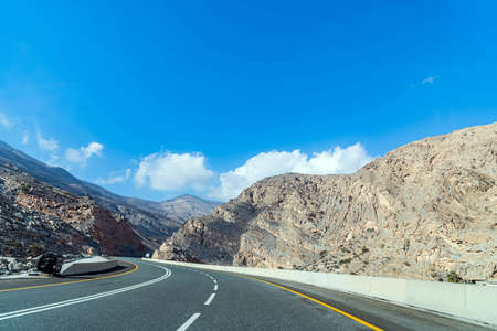 Geological landscape of Jebel Jais characterised by dry and rocky mountains, Mud Mountains in Ras Al Khaimah, United Arab Emiratesの写真素材