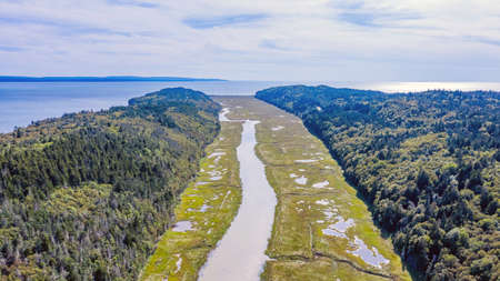 Drone view of Green Island in Canada. Island Aerial View. Beach Island. Blue Water Island.