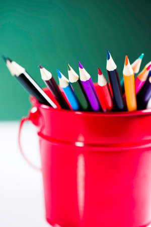 Pencils in a red bucketの写真素材