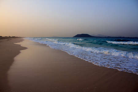 The beach is empty after a long sunny in Fuertaventura の写真素材