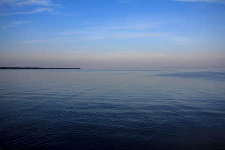 Looking out from Nida across the waters between the Curonian Spit National Park and the mainland of lithuania  Looking towards the mainland, the sea is usually very calm の写真素材
