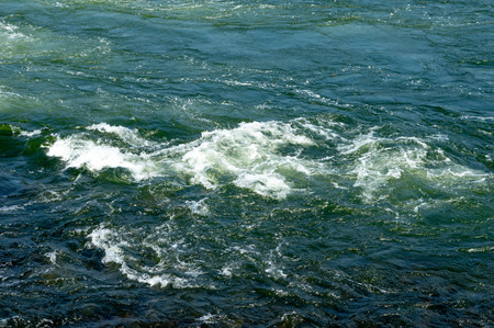 The beauty of a river flowing over rocks.