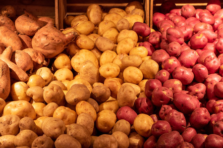 Some potatoes at the local vegetable market in the city.の写真素材