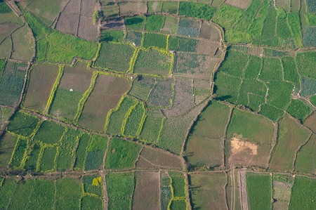 A beautiful aerial view of farmland and buildings in the country of Nepal.