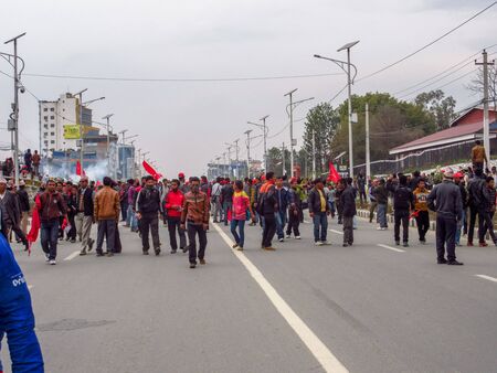 Kathmandu, Nepal - February 28, 2015: Rioters and prostestors take to the streets in Kathmandu,...
