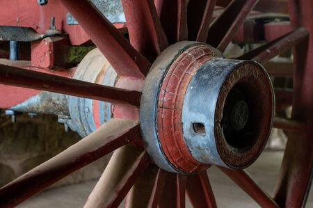 An old wagon wheel hub and all the spokes.