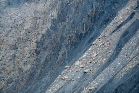 A background of layered and textured rock.の写真素材