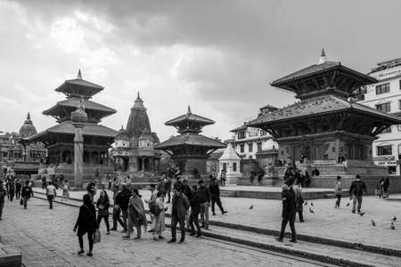 Patan, Nepal - March 5, 2020: Tourists walking on the streets of the Patan Durbar Marg the UNESCO World Heritage Site in Kathmandu, Nepal.のeditorial素材