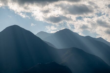 A Sunray Shining through the Clouds on a Hill in Nepal.