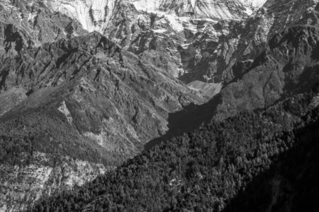 The beautiful Pine Covered Hills and Deep Valleys in the Himalaya Mountains of Nepal on the popular...