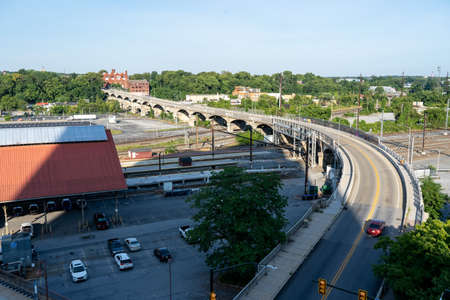 Harrisburg, Pennsylvania - July 18, 2020: A stone arched bridge over the railroad tracks at the...