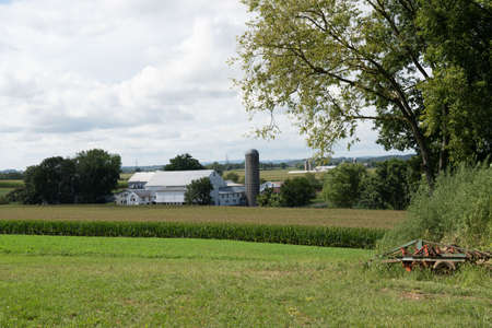 A small dairy farm in the rural countryside of Lancaster County, Pennsylvania.の写真素材