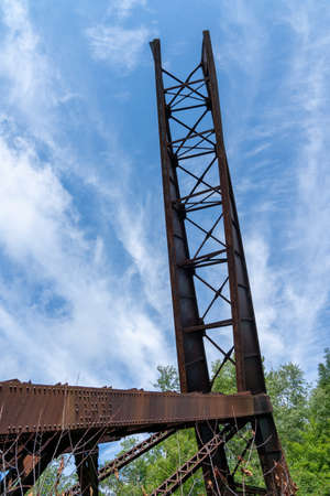 A giant girder of the destroyed Kinzua Bridge sticking up into the sky.の写真素材