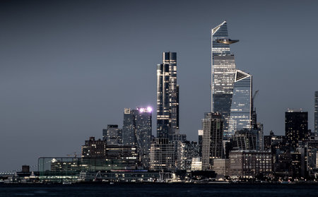 New York, New York - September 11, 2020: A view of the skyscrapers of Manhattan Island in the light...