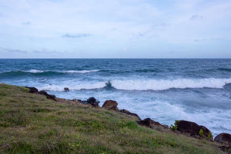 A relaxing evening by the sea with the breaking waves.