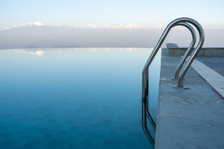 Infinity pool with the Himalaya Mountains in the background.の写真素材