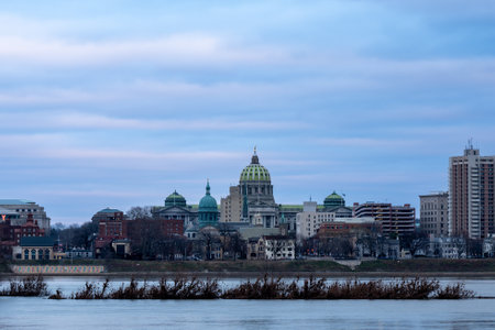 The beauty of the Harrisburg City Skyline at Dusk with the city lights coming on from across the Susquehanna River.の写真素材