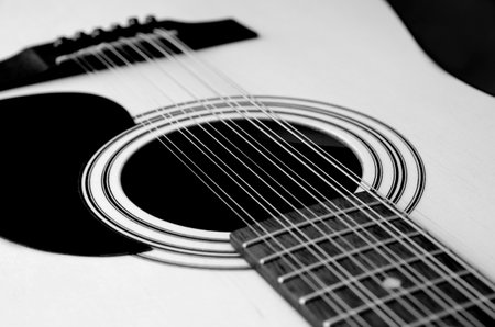 Acoustic guitar on a white background. close-up. black and white.の写真素材