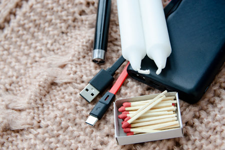 yellow cup of coffee in the hands of a girlの写真素材