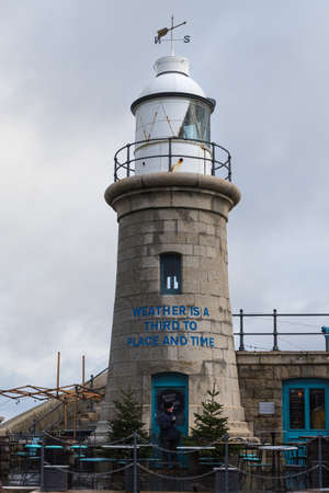 Lighthouse on the Harbour Arm at Folkstone on an overcast day, taken 5th Dec 2021.