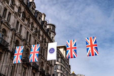 Banner and flags hang high above Regent Street in London as preperations are in full swing for the...