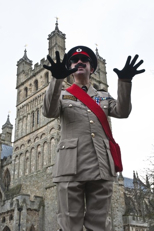 Stuart Crewes, aka Genral Assembly addresses other Occupy Exeter activists during Occupy Exeter leaving celebration on Exeter Cathedral Green.のeditorial素材